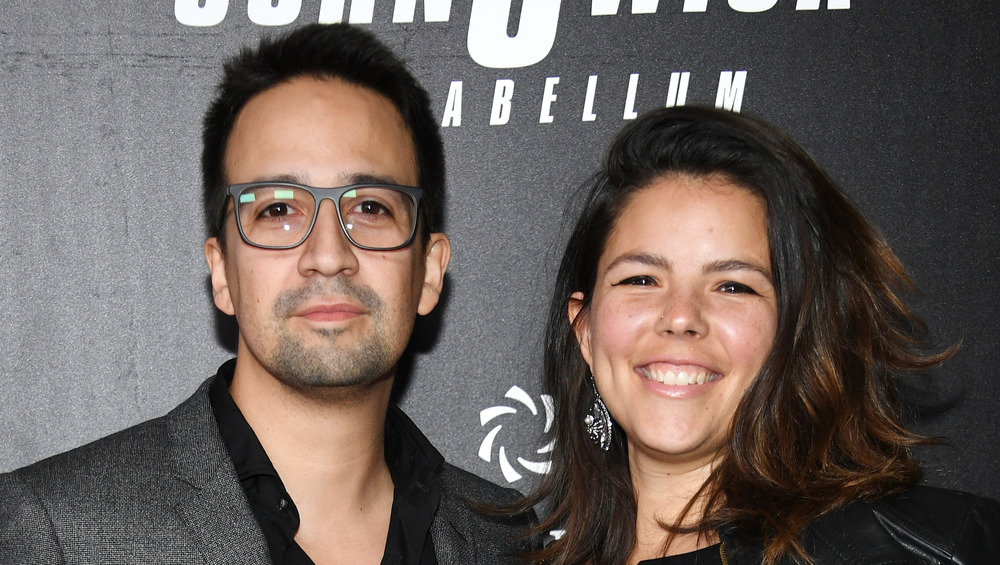 Lin-Manuel Miranda, his wife smiling