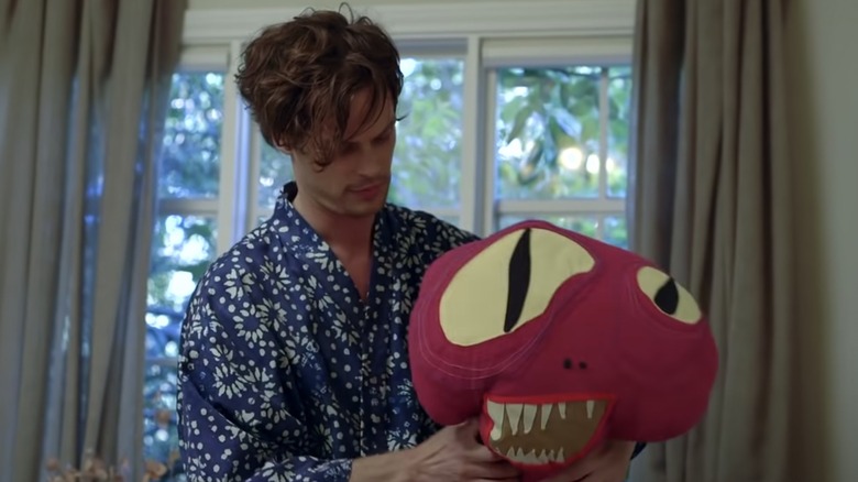 Matthew Gray Gubler with his puppets