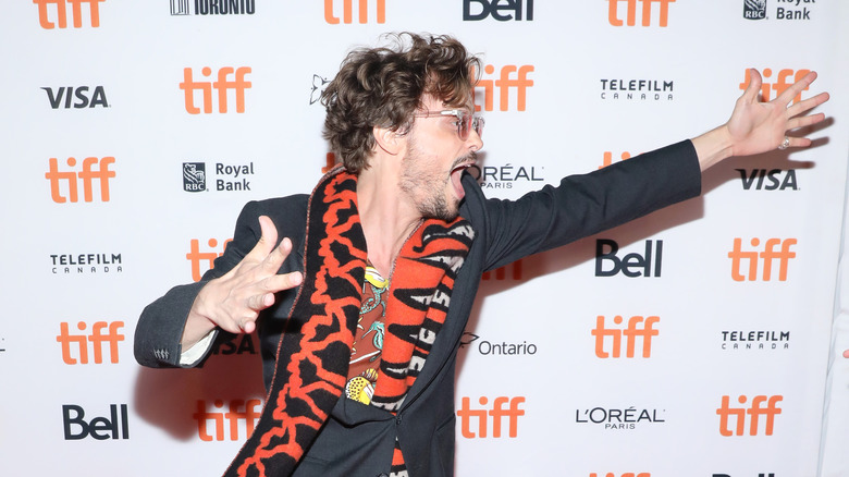 Matthew Gray Gubler posing on the red carpet