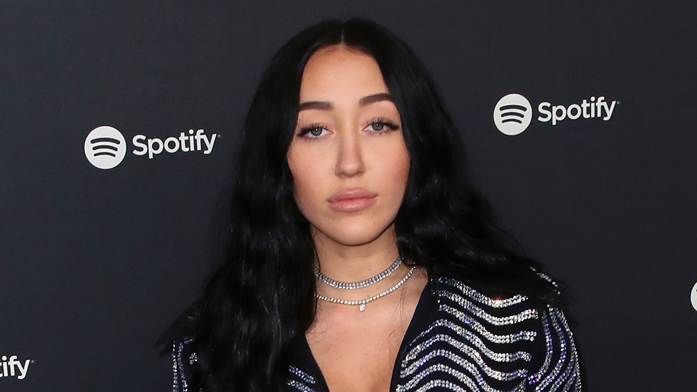 Noah Cyrus posing