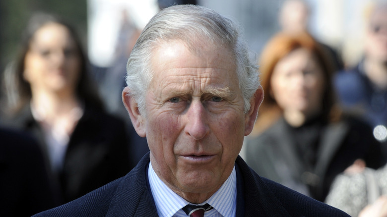 Prince Charles wearing a blue suit