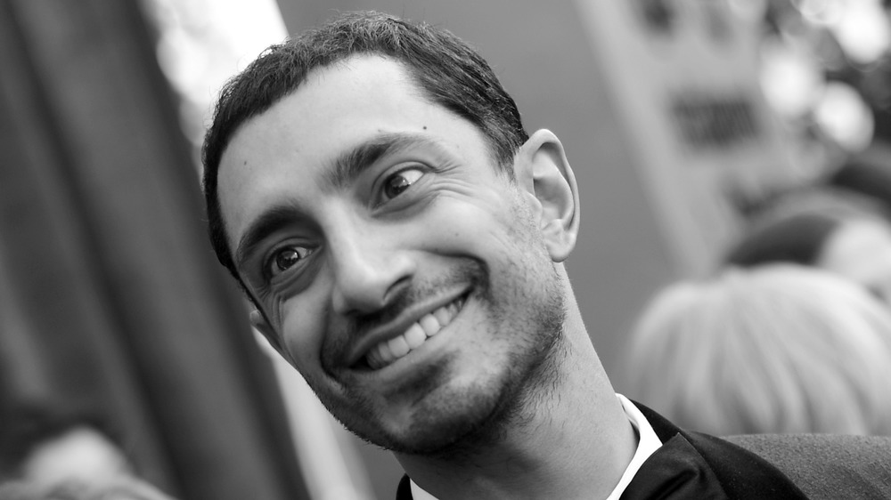 Riz Ahmed smiling