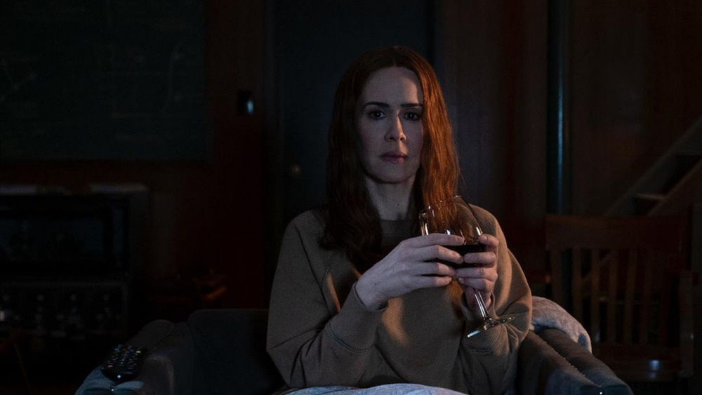 Sarah Paulson drinking wine in run