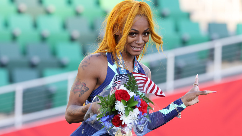 Sha'Carri Richardson holding flowers Olympic trials