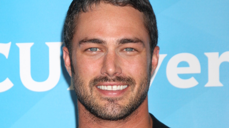 Taylor Kinney smiling