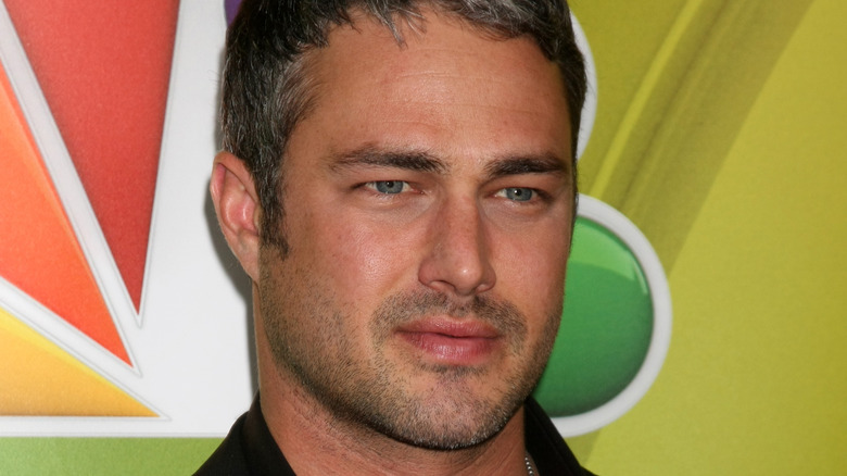 Taylor Kinney posing