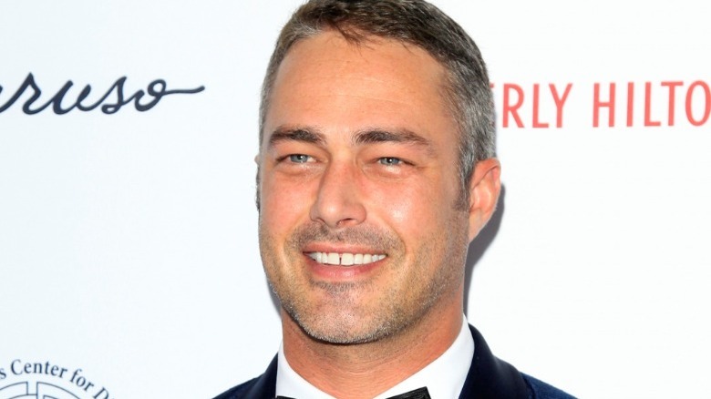 Taylor Kinney wearing tuxedo