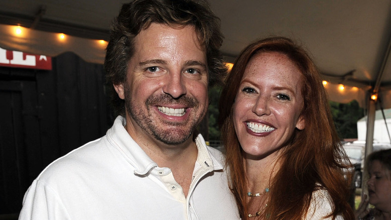 Tree Paine smiling with her husband