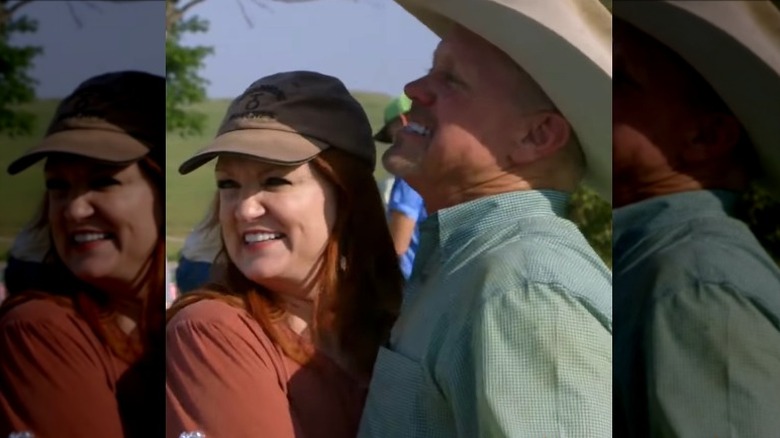 The Pioneer Woman's husband, Ladd Drummond, and Ree Drummond, smiling at each other