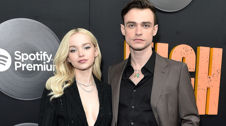 Dove Cameron and Thomas Doherty posing