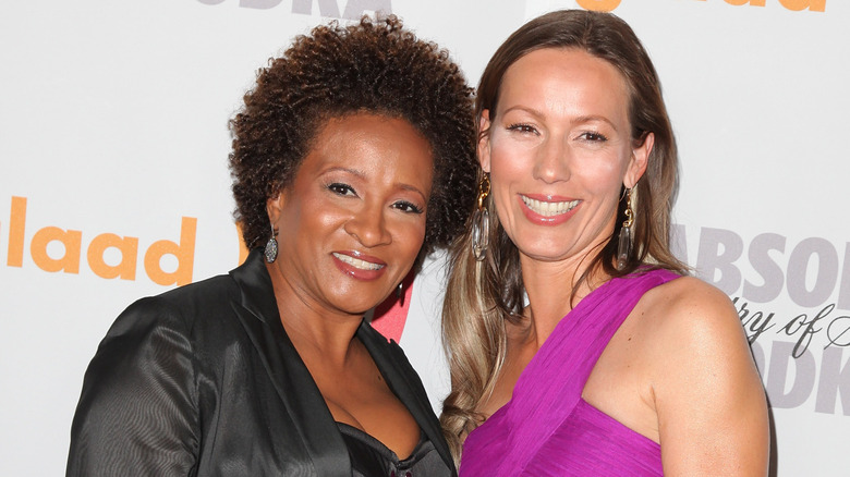 Wanda Sykes and wife Alex Sykes smiling