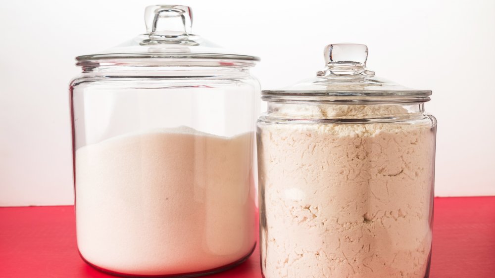 Different clear bottles of flour