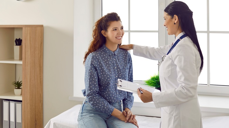 Woman speaking to her doctor