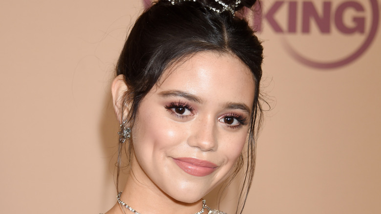 Jenna Ortega wearing a high bun at a premiere