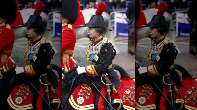 Princess Anne riding horse in uniform