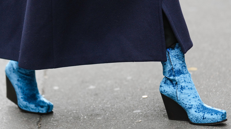 Blue velvet boot with black wedge heel