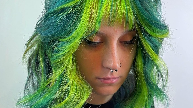 woman with green color block hair