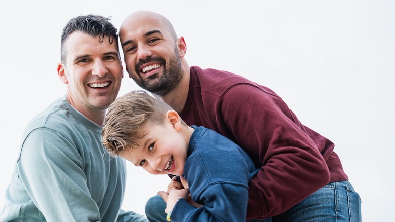 fathers and son smiling