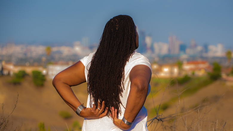 Woman with sisterlocks 