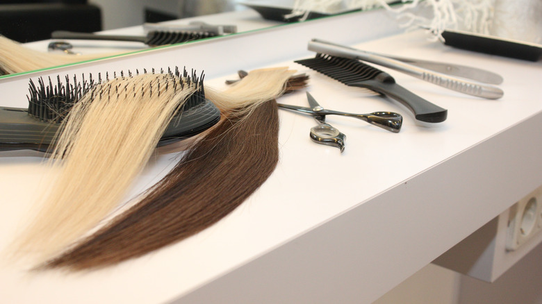 Hair extensions and hair tools on a table