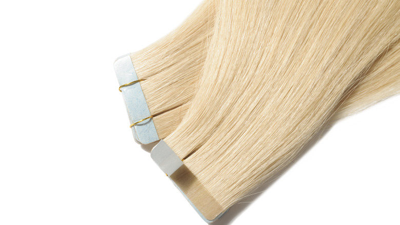 Blonde hair extensions on a table