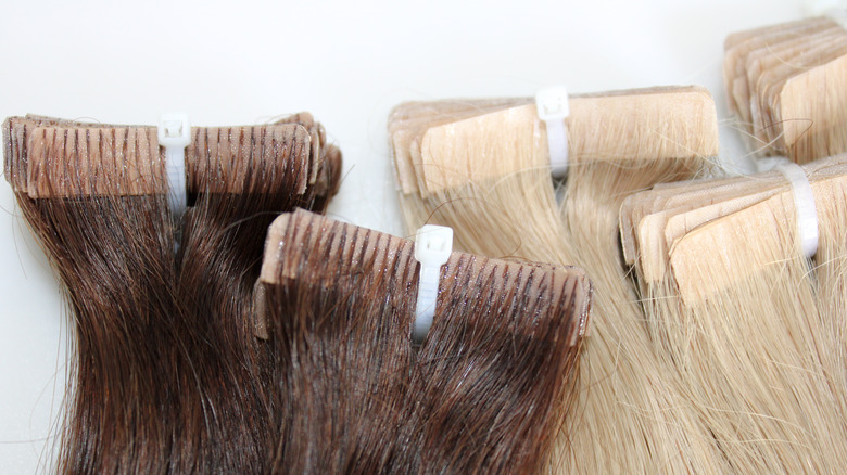 varying hair extensions on white background