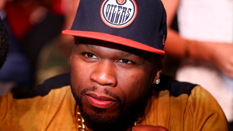 50 Cent wearing a cap