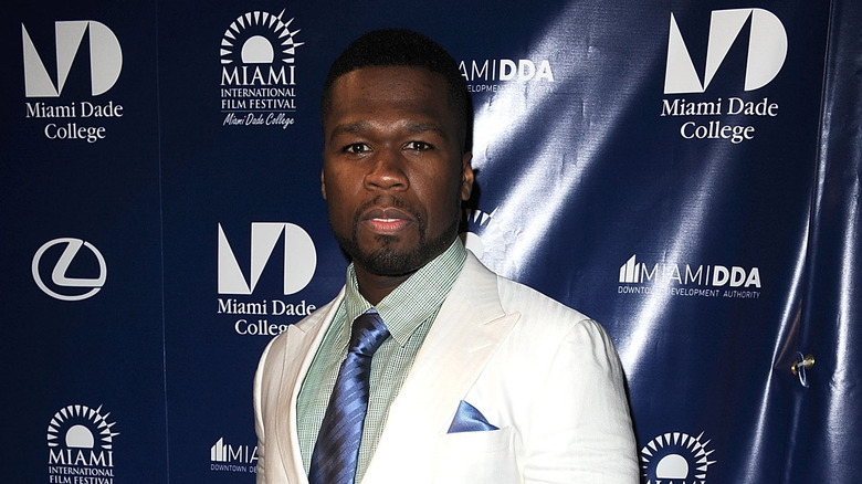 50 Cent wearing a suit