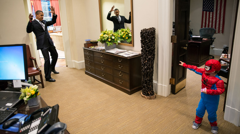 Obama and child dressed as Spider-Man