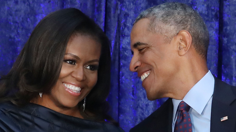 Michelle and Barack Obama smiling