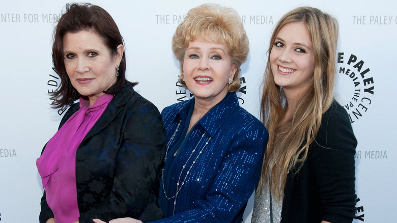 Carrie Fisher, Debbie Reynolds, and Billie Lourd on the red carpet