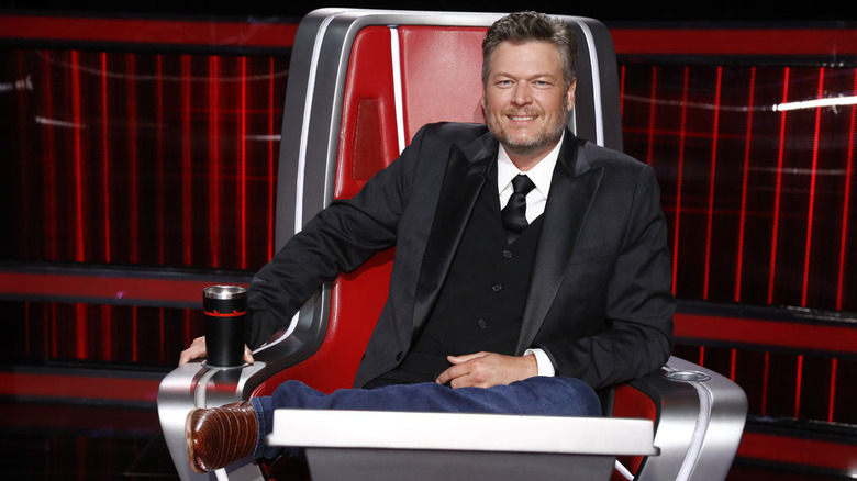 Blake Shelton with beverage on The Voice