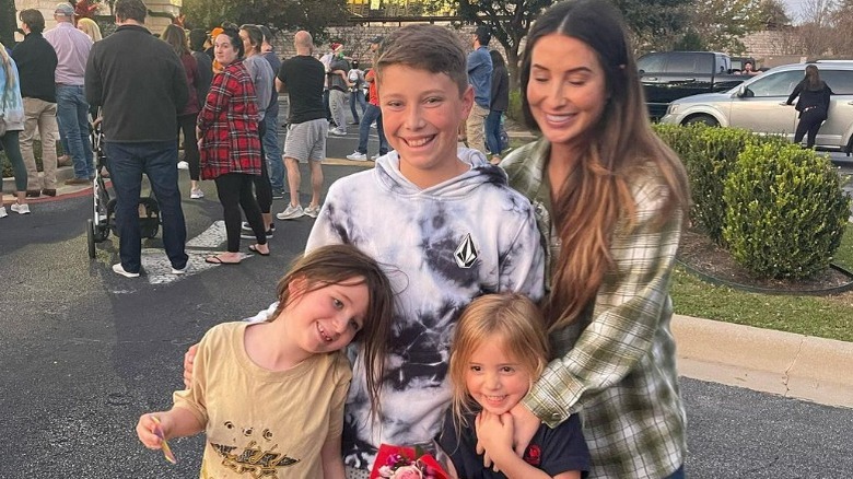 Bristol Palin posing with her kids