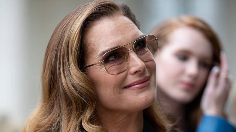 Brooke Shields smiling in sunglasses