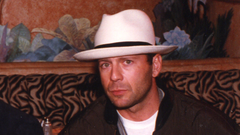 Bruce Willis wearing a fedora