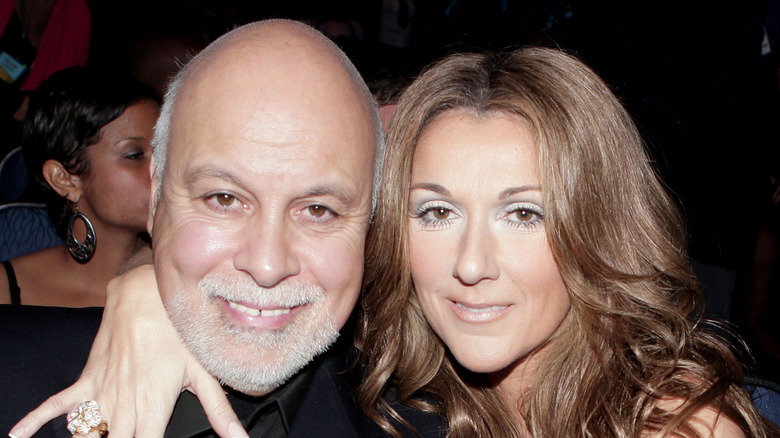 René Angélil and Celine Dion smiling