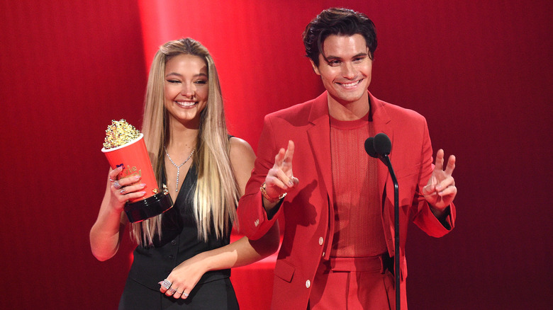 Chase Stokes, Madelyn Cline on stage