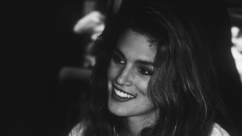 Young Cindy Crawford smiling