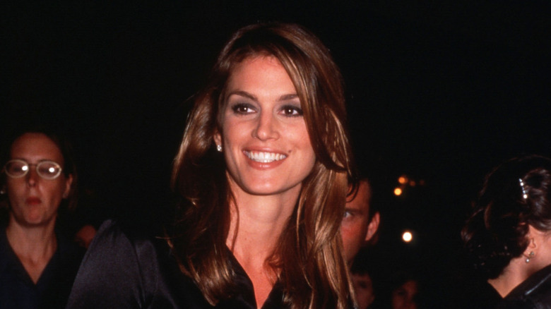Young Cindy Crawford smiling