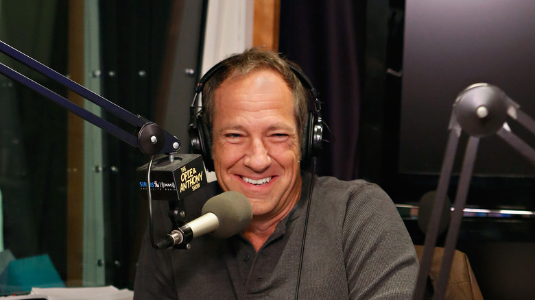 Mike Rowe with headphones, microphone