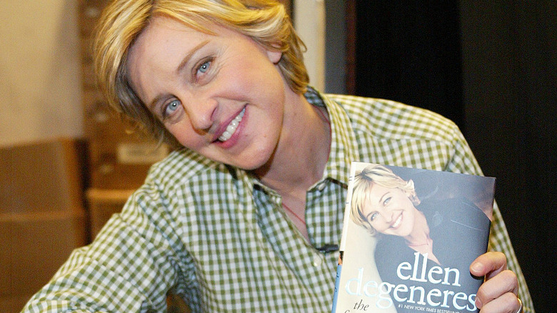 Ellen DeGeneres posing with her book