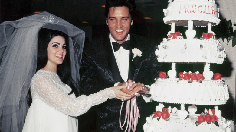 Priscilla and Elvis Presley smiling 