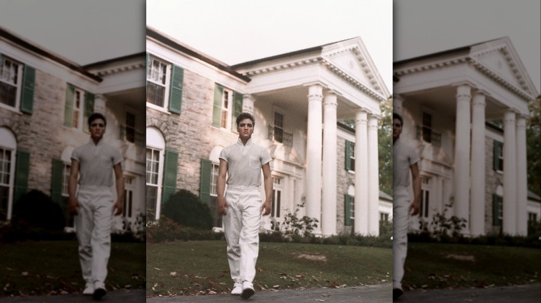 Elvis Presley walking the grounds of his home