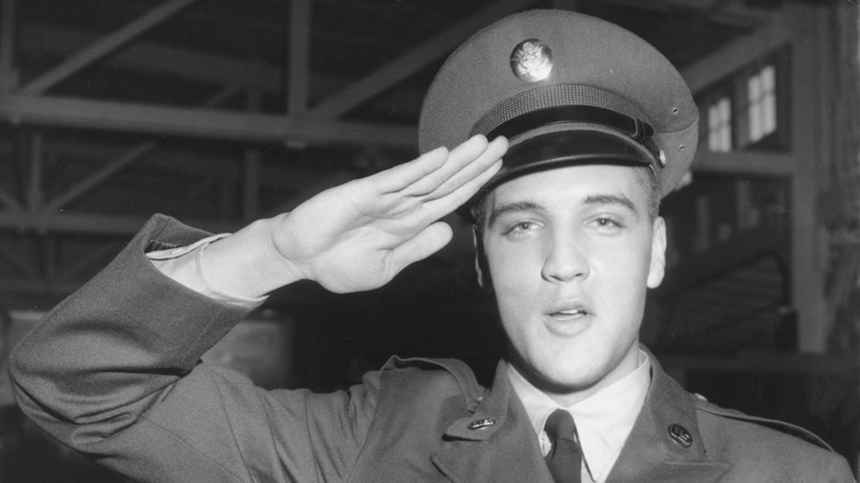 Elvis Presley saluting 