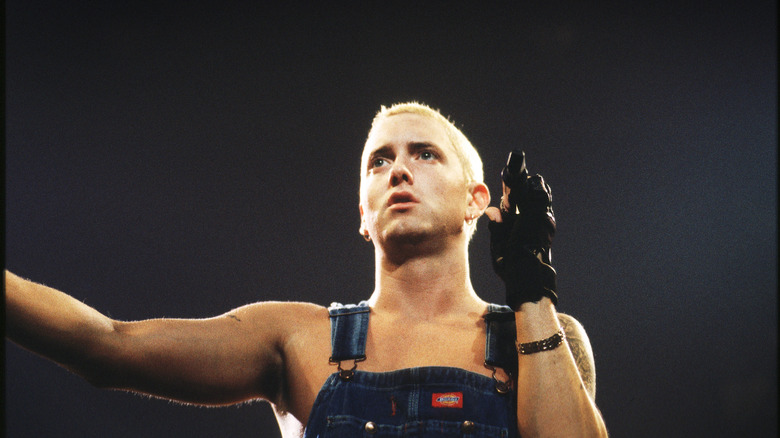 Young Eminem performing in overalls