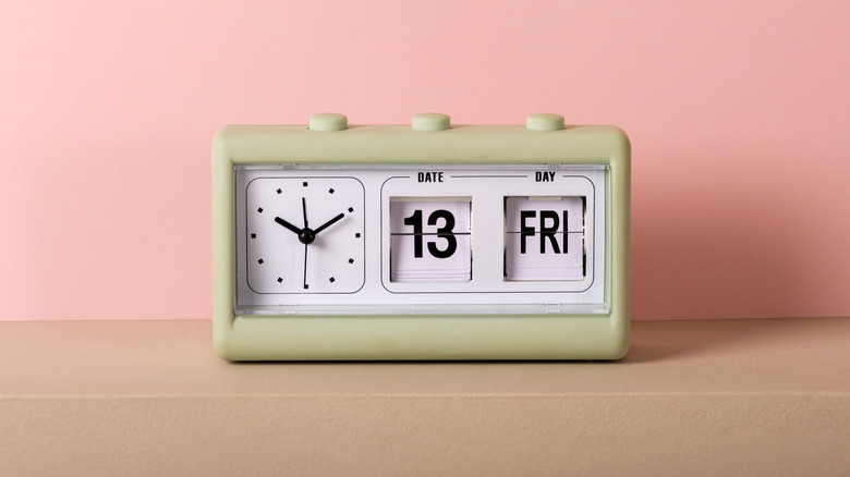 vintage clock shows Friday the 13th