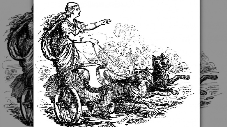 Goddess Frigg drives chariot pulled by cats