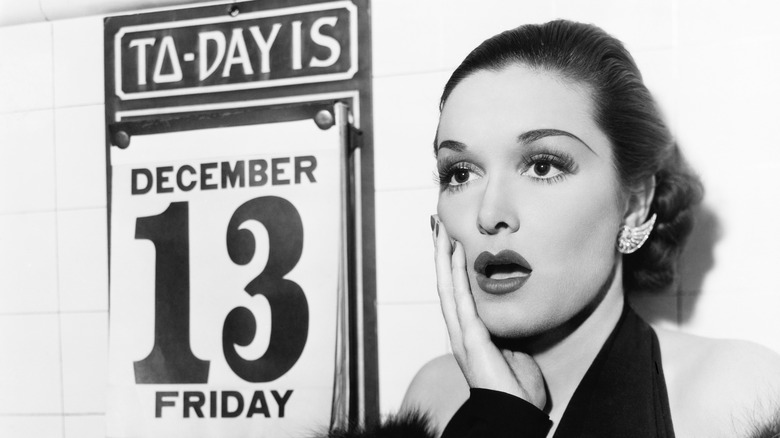 Woman looks shocked that it's Friday the 13th