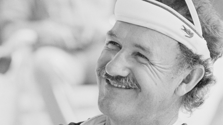 Gene Hackman wearing a visor