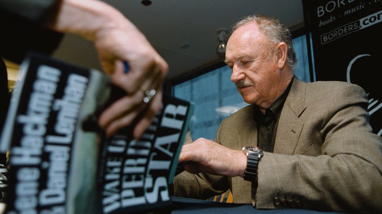 Gene Hackman signing books